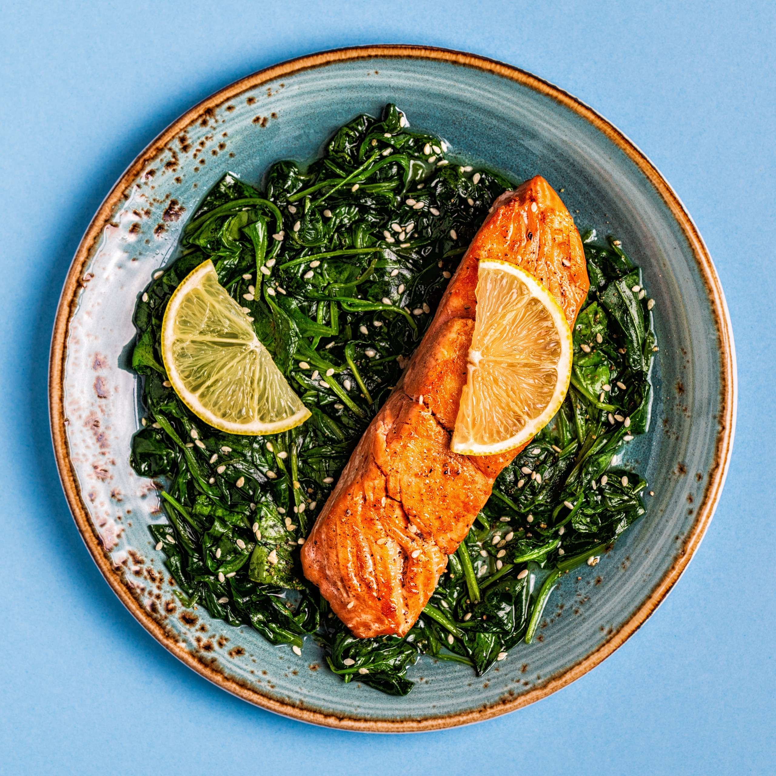 Grilled salmon with spinach.